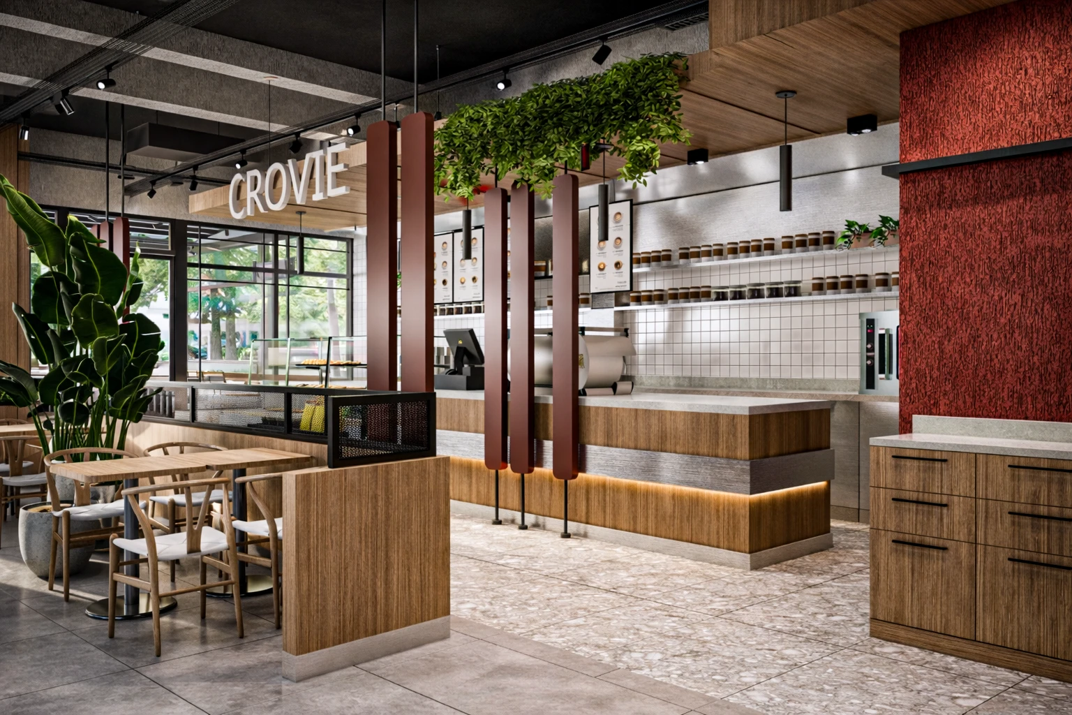 Crovie Coffee iç mekan geniş açı, pastane vitrini, kırmızı duvar, silindir avizeler ve oturma alanı
