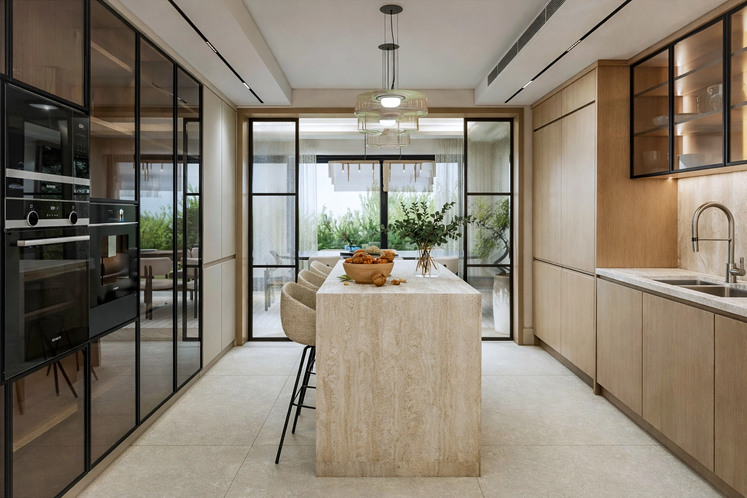 M.G. Villa mutfak — travertin ada tezgah, siyah çerçeveli cam bölme ve meşe dolap